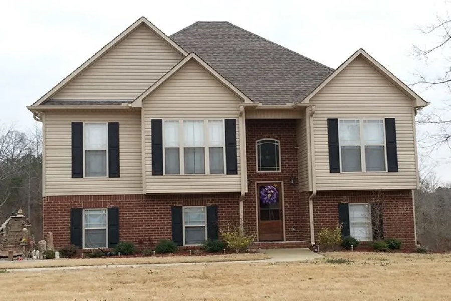 Completed shingle roof on a two-story home